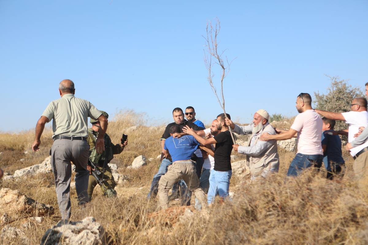 Israeli forces intervene to Palestinians who staged a demonstration against land confiscation of Jewish settlers in Hebron, West Bank on 01 August 2023 [Mamoun Wazwaz - Anadolu Agency]