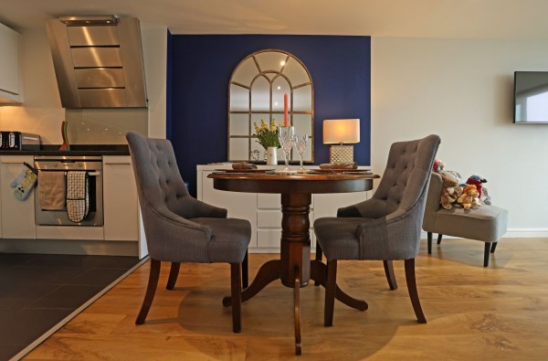 General view of the open plan living room and kitchen