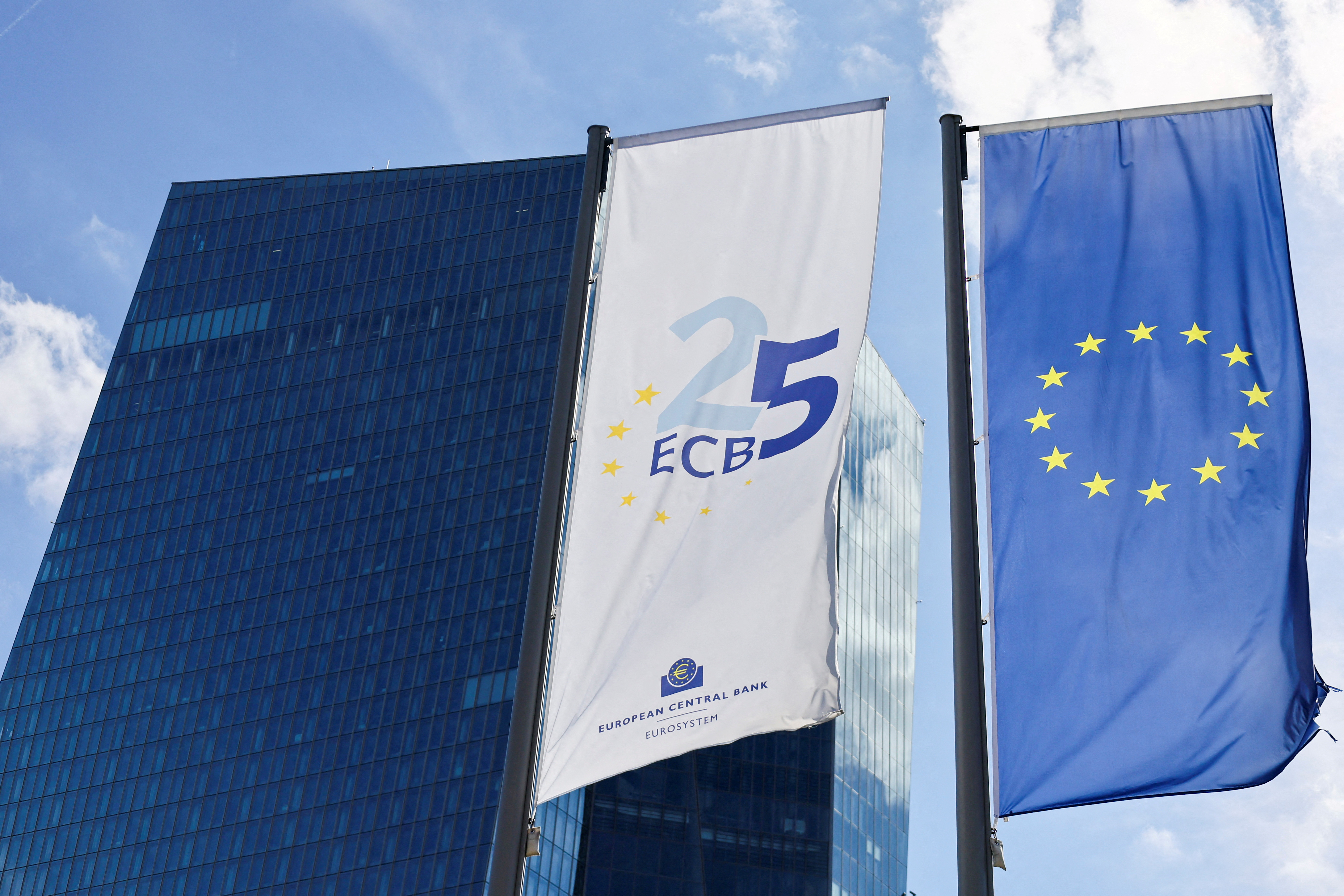 Flags in front of the European Central Bank building in Frankfurt, Germany