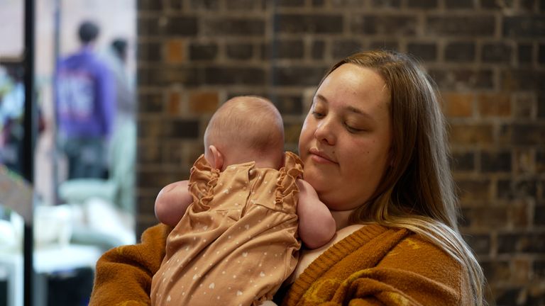 Kayla holding Ivy