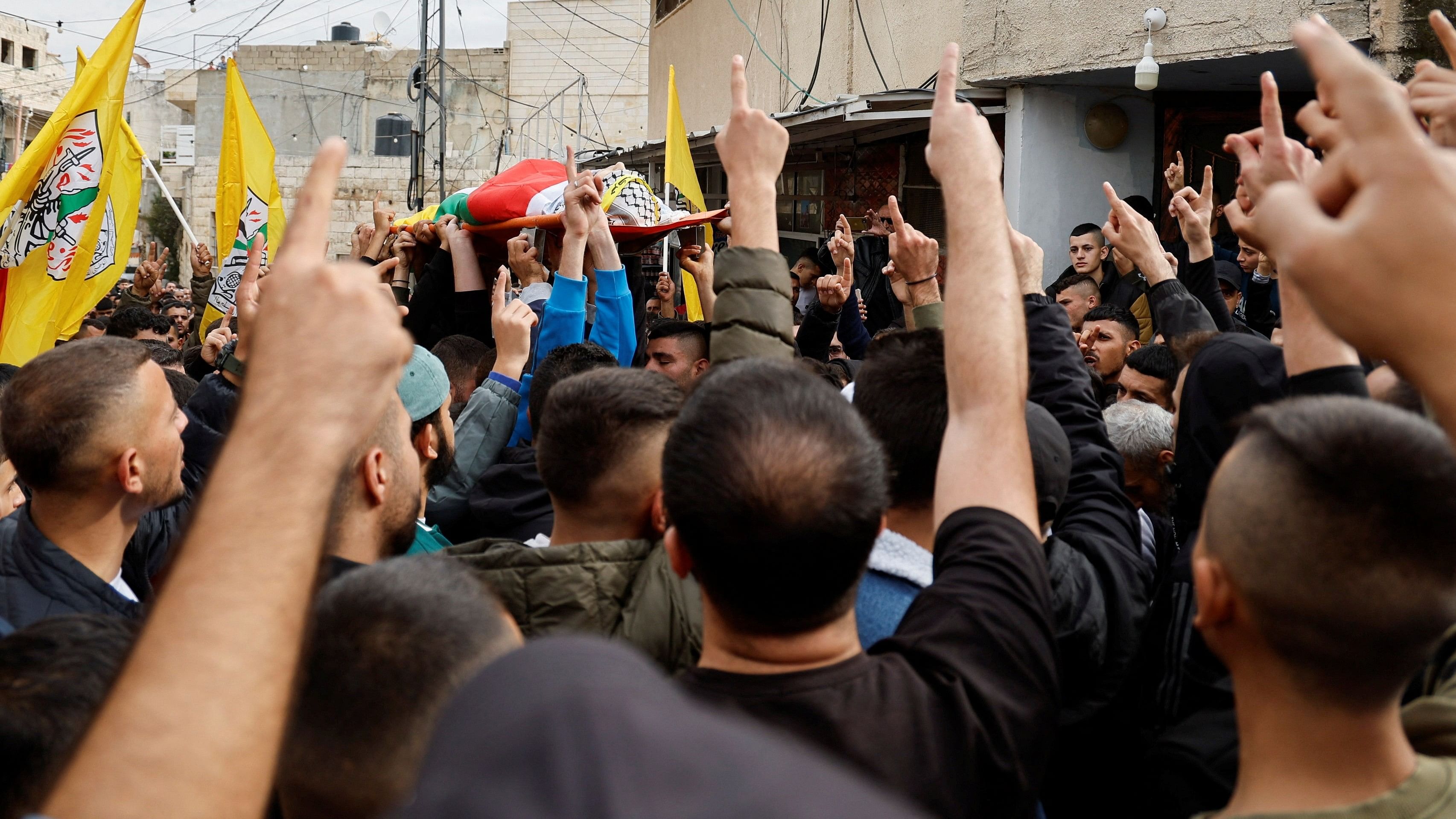 <div class="paragraphs"><p>Mourners carry body of Shamikh Abualrob, Palestinian who was killed in an Israeli raid, during his funeral in Qabatia near Jenin in the Israeli-occupied West Bank, November 25, 2023. </p></div>