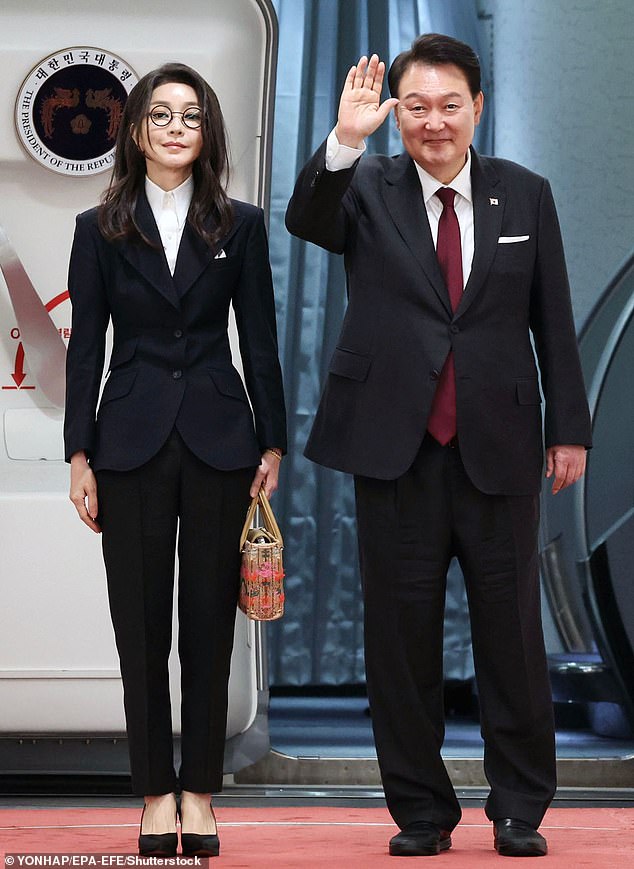 Keon-hee married Yoon Suk-yeol in 2012 - and last year, he became South Korea's 13th president. Both pictured in October