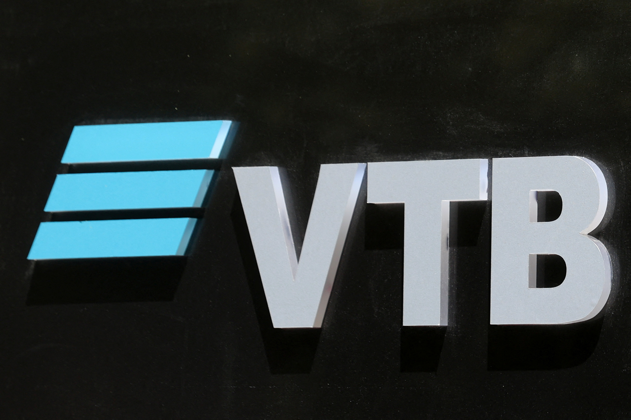 The logo of VTB bank is seen on the bank's headquarters in Tehran