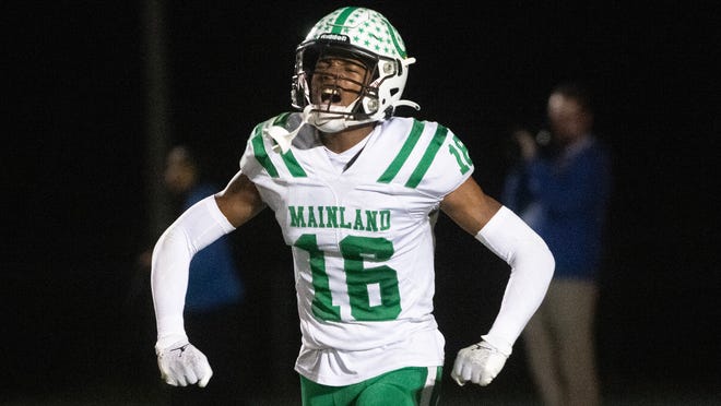 Mainland's Jamie Tyson celebrates during Mainland's 41-7 victory over Winslow Township in the Group 4 state semifinal football game played at Winslow Township High School on Friday, November 17, 2023.