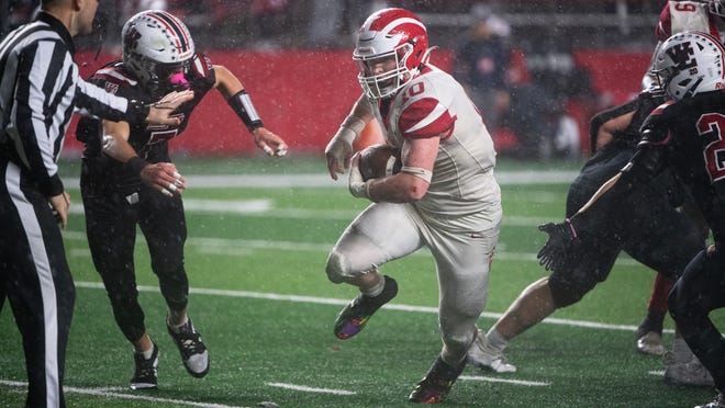 Delsea's Dan Russo runs the ball during the Group 3 state championship football game between Delsea and West Essex played at Rutgers University in Piscataway on Sunday, November 26, 2023.