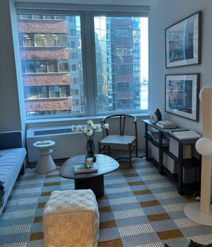 The living room of a finished unit at 160 Water Street in Mnahattan which is being converted from an office tower to a residential building