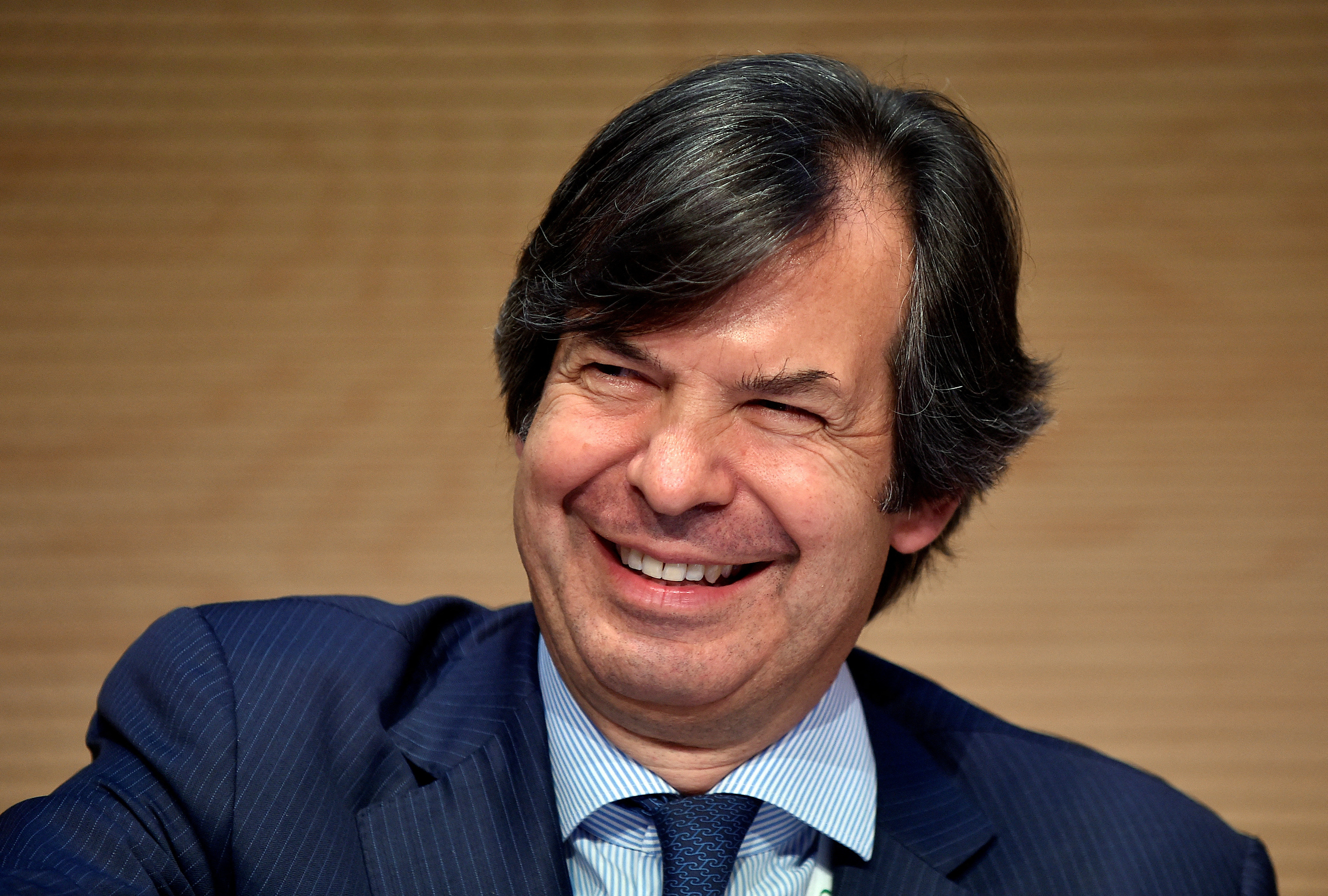 Carlo Messina, CEO of Intesa Sanpaolo bank smiles during shareholders meeting in Turin