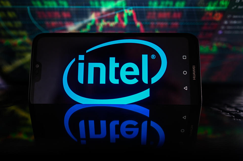 POLAND - 2023/10/19: In this photo illustration Intel logo is displayed on a smartphone with stock market percentages on the background. (Photo Illustration by Omar Marques/SOPA Images/LightRocket via Getty Images)