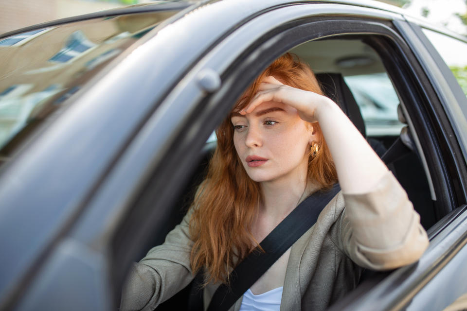 Women driver worried about car insurance. Photo: Getty