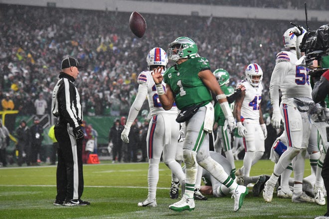 Nov 26, 2023; Philadelphia, Pennsylvania, USA; Philadelphia Eagles quarterback Jalen Hurts (1) celebrates his touchdown run against the Buffalo Bills during the first quarter at Lincoln Financial Field. Mandatory Credit: Eric Hartline-USA TODAY Sports