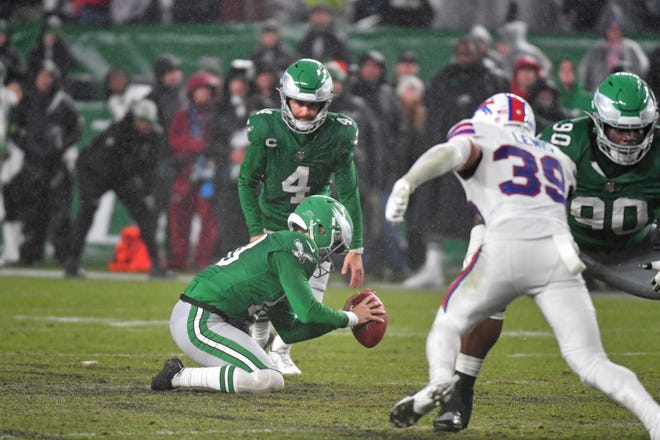 Nov 26, 2023; Philadelphia, Pennsylvania, USA; Philadelphia Eagles place kicker Jake Elliott (4) kicks game-tying field goal in regulation against the Buffalo Bills at Lincoln Financial Field. Mandatory Credit: Eric Hartline-USA TODAY Sports