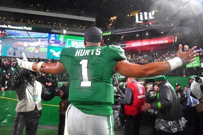 Nov 26, 2023; Philadelphia, Pennsylvania, USA; Philadelphia Eagles quarterback Jalen Hurts (1) walks off the field after overtime win against the Buffalo Bills at Lincoln Financial Field. Mandatory Credit: Eric Hartline-USA TODAY Sports