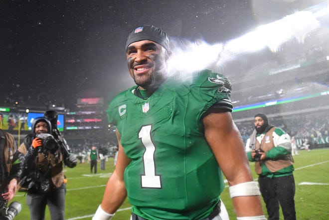 Nov 26, 2023; Philadelphia, Pennsylvania, USA; Philadelphia Eagles quarterback Jalen Hurts (1) walks off the field after overtime win against the Buffalo Bills at Lincoln Financial Field. Mandatory Credit: Eric Hartline-USA TODAY Sports