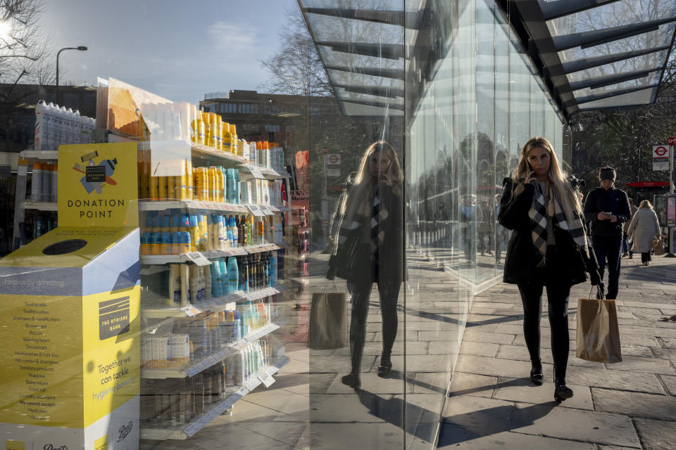 ftse City workers and shoppers in an urban landscape of symmetrical retail reflections and diagonals outside a branch of Boots The Chemist in the City of London, the capital's financial district, on 16th January 2024, in London, England. (Photo by Richard Baker / In Pictures via Getty Images)