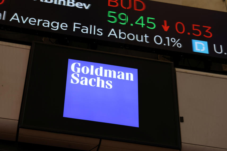 The logo for Goldman Sachs is seen on the trading floor at the New York Stock Exchange