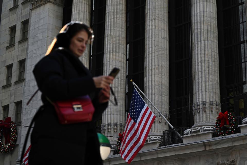 Wall Street Photo by: NDZ/STAR MAX/IPx 2024 1/2/24 People walk past the New York Stock Exchange (NYSE) on the first trading day of 2024 on January 02, 2024 in New York City.