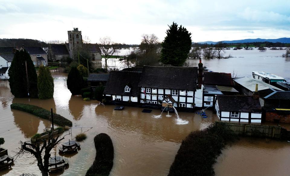 The village of Severn Stoke is cut off amid flooding after heavy rain from Storm Henk, near Worcester, Britain, January 3, 2024 (REUTERS)