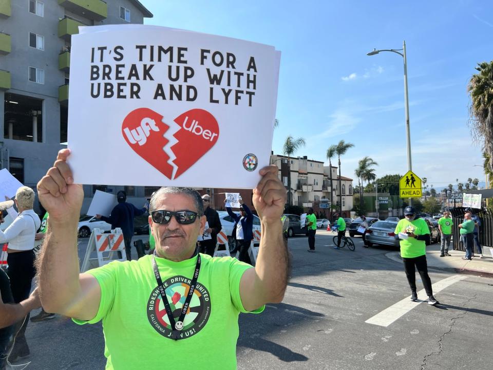Francisco Magdaleno, 55, of Los Angeles, was among about 50 Uber and Lyft drivers protesting the rideshare apps in Los Angeles on Valentine's Day, Feb. 14, 2024. He says "We are barely surviving" and that "We need changes."