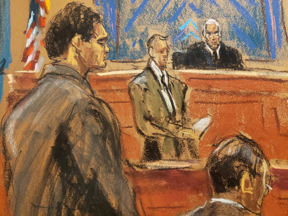 FTX founder Sam Bankman-Fried stands as the jury foreperson reads the verdict in his fraud trial over the collapse of the bankrupt cryptocurrency exchange at federal court in New York City, U.S., November 2, 2023, in this courtroom sketch. REUTERS/Jane Rosenberg