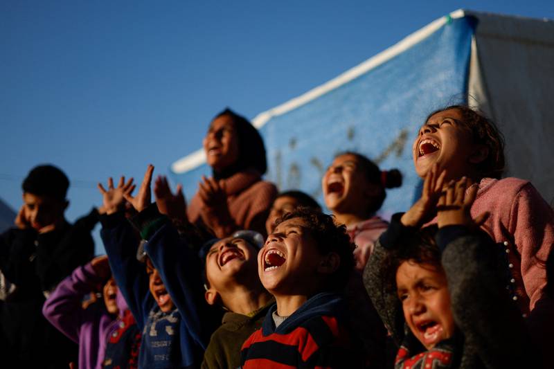 Displaced Palestinian children, who were forced to flee their houses due to Israeli bombing, take part in activities at a school run by UNRWA in Rafah, southern Gaza. Reuters