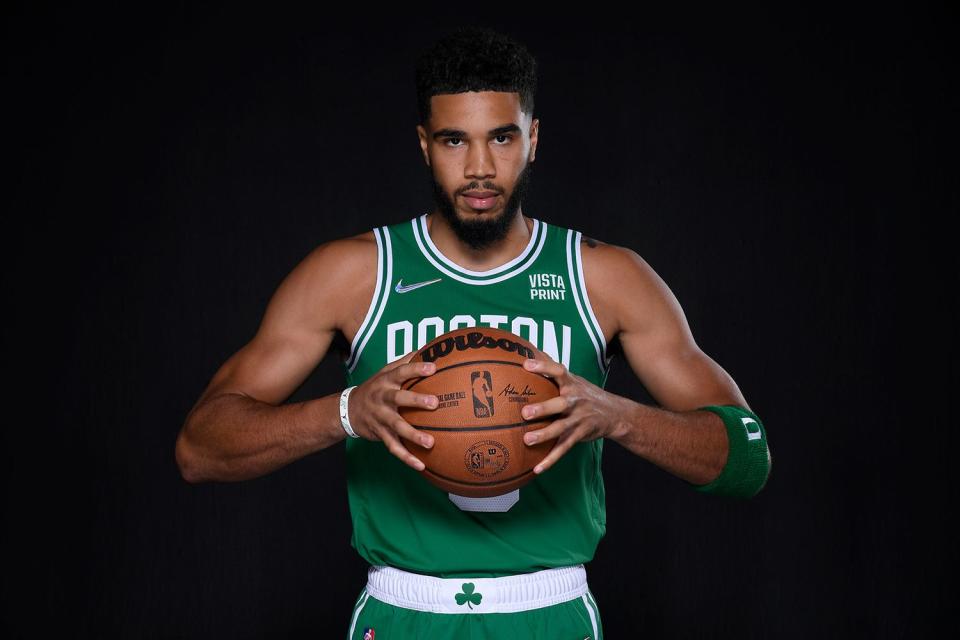 <p>Brian Babineau/NBAE via Gett</p> Jayson Tatum #0 of the Boston Celtics poses for a head shot during NBA media day 