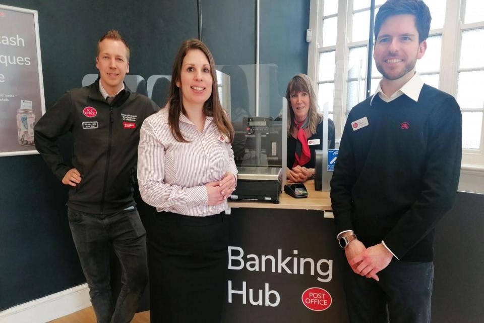 Daniel Cummins from the Post Office with some of the Community Banking Hub team, Caroline Willis, Jackie Walker and Mike Grimmer <i>(Image: NQ staff)</i>