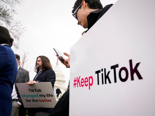 Protesters outside of the United States Capitol as the House voted and approved a bill Wednesday that would force TikTok’s parent company to sell the popular social media app or face a practical ban in the U.S.