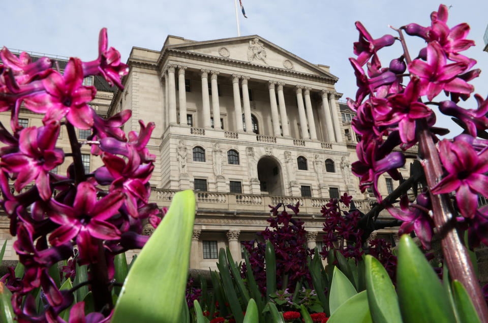 Spring flowers bloom in front of the Bank of England building, in London, Britain, March 21, 2024. REUTERS/Toby Melville