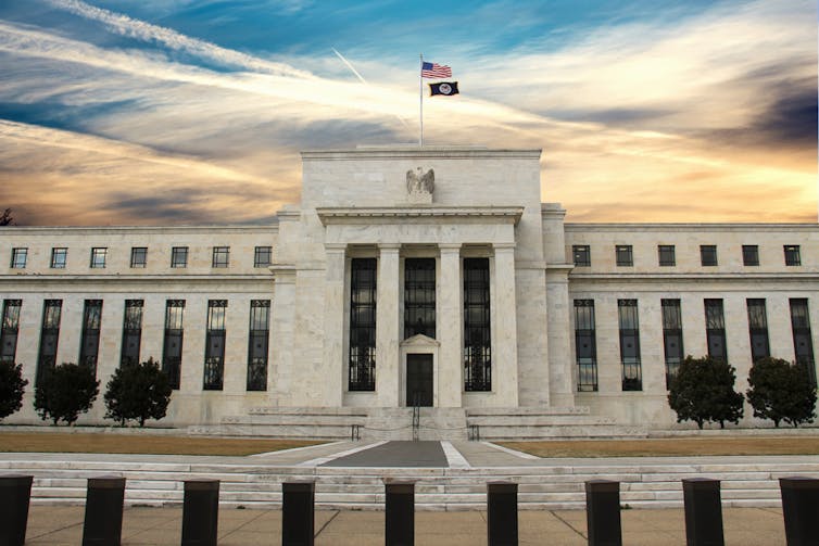 Federal Reserve under dramatic skies