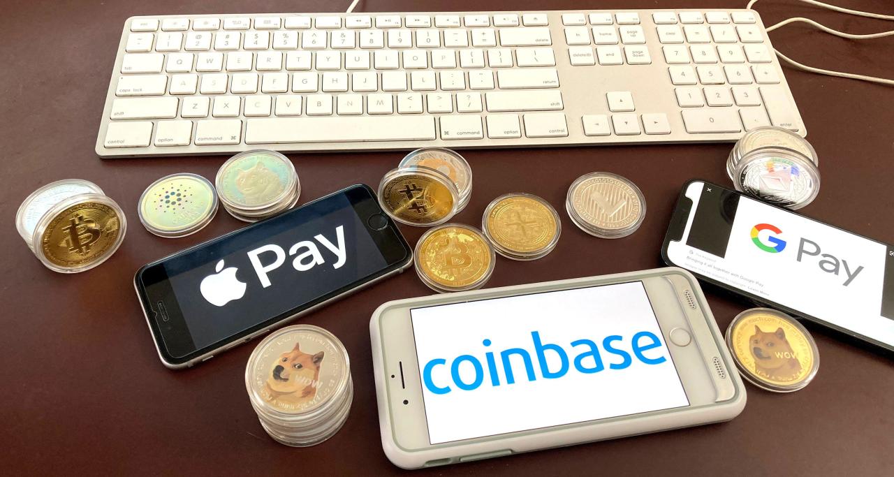 Photo by: STRF/STAR MAX/IPx 2021 6/2/21 Coinbase to launch its Coinbase Card on Apple Pay and Google Pay. STAR MAX Photo: Apple Pay, coinbase and Google Pay logos photographed on multiple iPhone devices.