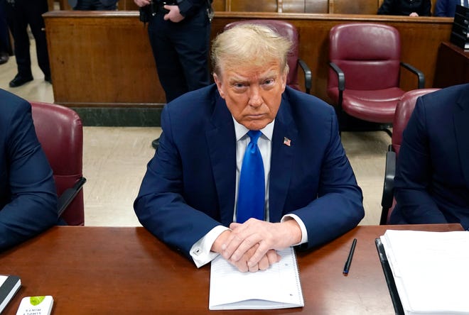 Former President Donald Trump attends his criminal trial as jury selection continues at Manhattan Criminal Court on April 18, 2024 in New York City. Trump was charged with 34 counts of falsifying business records last year, which prosecutors say was an effort to hide a potential sex scandal, both before and after the 2016 presidential election. Trump is the first former U.S. president to face trial on criminal charges.