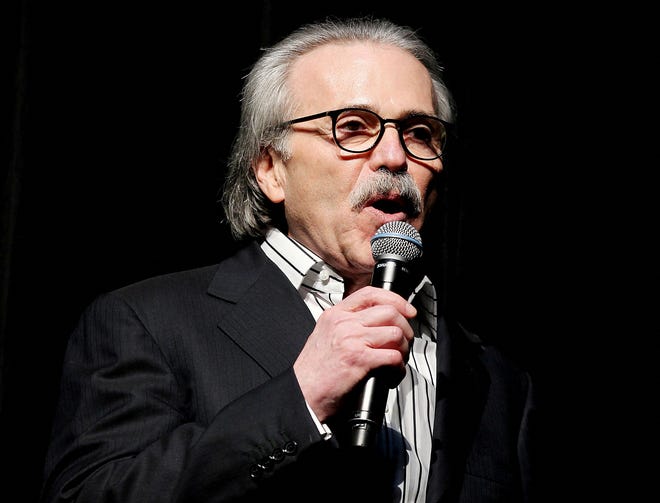 David Pecker, chair and CEO of American Media, speaks at the Shape and Men's Fitness Super Bowl Party in New York City on Jan. 31, 2014.