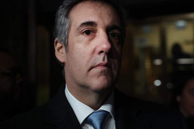 Former Donald Trump lawyer and loyalist Michael Cohen walks out of a Manhattan courthouse after testifying before a grand jury on March 13, 2023 in New York City. The grand jury is investigating payments Cohen arranged and made on behalf of the former president.
