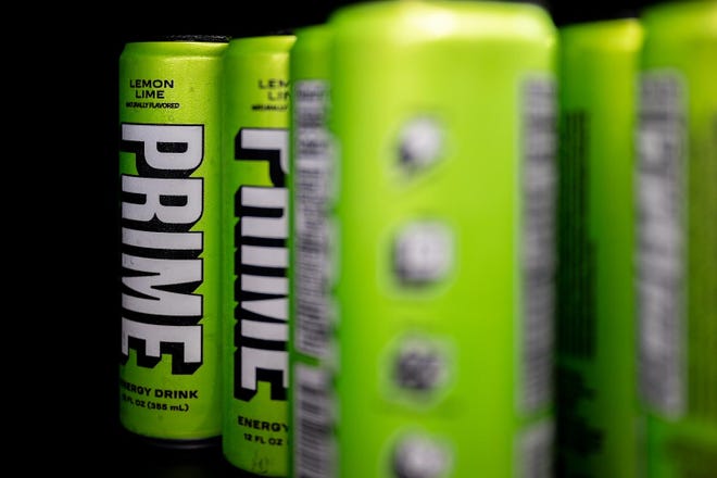 Prime energy drinks are displayed for sale on shelves at a Walmart Supercenter on July 10, 2023 in Austin, Texas.