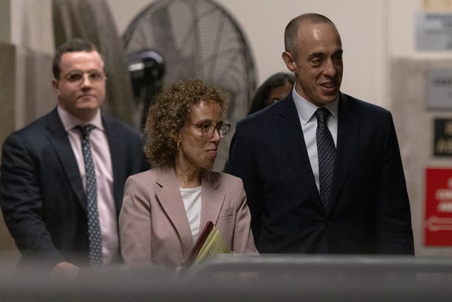 Susan Necheles and Emil Bove, attorneys for former US President Donald Trump, return following a break at court for his trial for allegedly covering up a hush money payment at Manhattan Criminal Court on April 26, 2024 in New York City. Former U.S. President Donald Trump faces 34 felony counts of falsifying business records in the first of his criminal cases to go to trial.