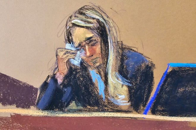 Hope Hicks, a former top aide to former U.S. President Donald Trump, reacts while being cross examined by defense lawyer Emil Bove during Trump's criminal trial on charges that he falsified business records to conceal money paid to silence porn star Stormy Daniels in 2016, in Manhattan state court in New York City, U.S. May 3, 2024 in this courtroom sketch.