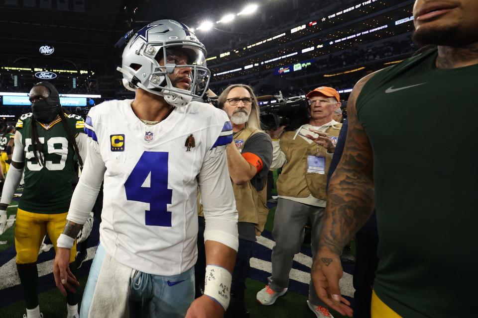 Dallas Cowboys quarterback Dak Prescott walks off the field after the 2024 NFC wild card game against the Green Bay Packers.