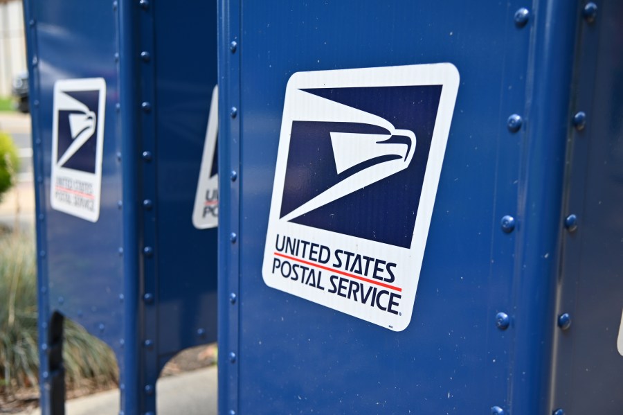 U.S. Postal Service mailboxes. (Photo by Theo Wargo/Getty Images)