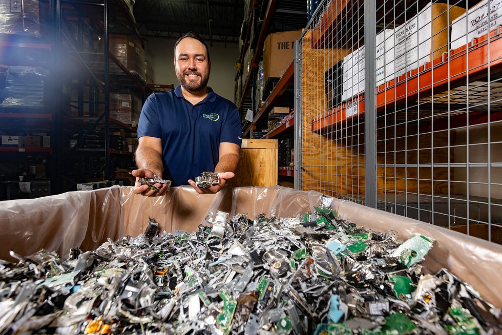 Anuar Garcia , founder and CEO of GreenTek Solutions, displays shredded hard drives in his 23,900-square-foot warehouse in Houston. GreenTek Solutions is an IT asset disposition company that helps mid-sized to large corporations dispose of their excess IT equipment. GreenTek makes sure company data is erased or destroyed, and that their equipment doesn’t end up in a landfill.