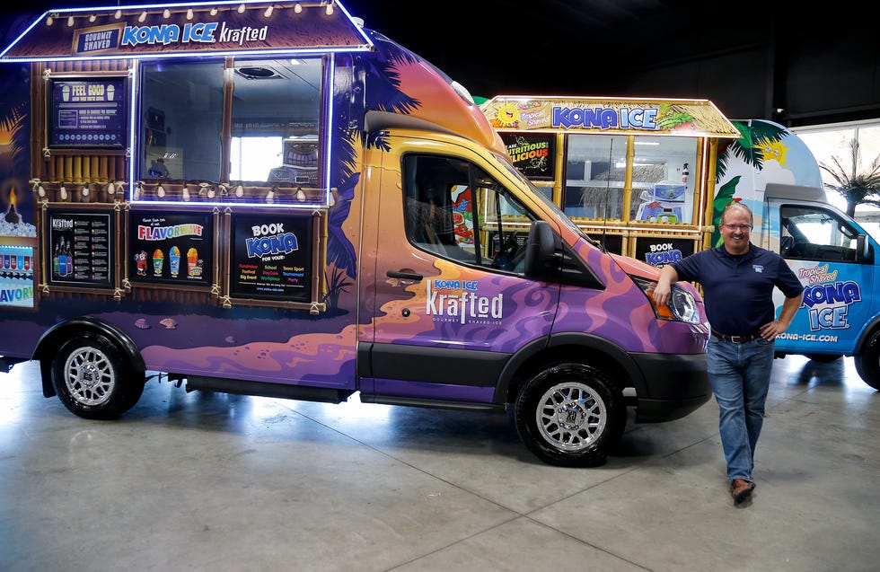 Tony Lamb, CEO of Kona Ice, with the company's crafted gourmet shaved ice truck at their headquarters in Florence, Ky. The crafted truck is geared toward adults. Flavors include Irish coffee, bourbon black cherry vanilla and peach ghost pepper.