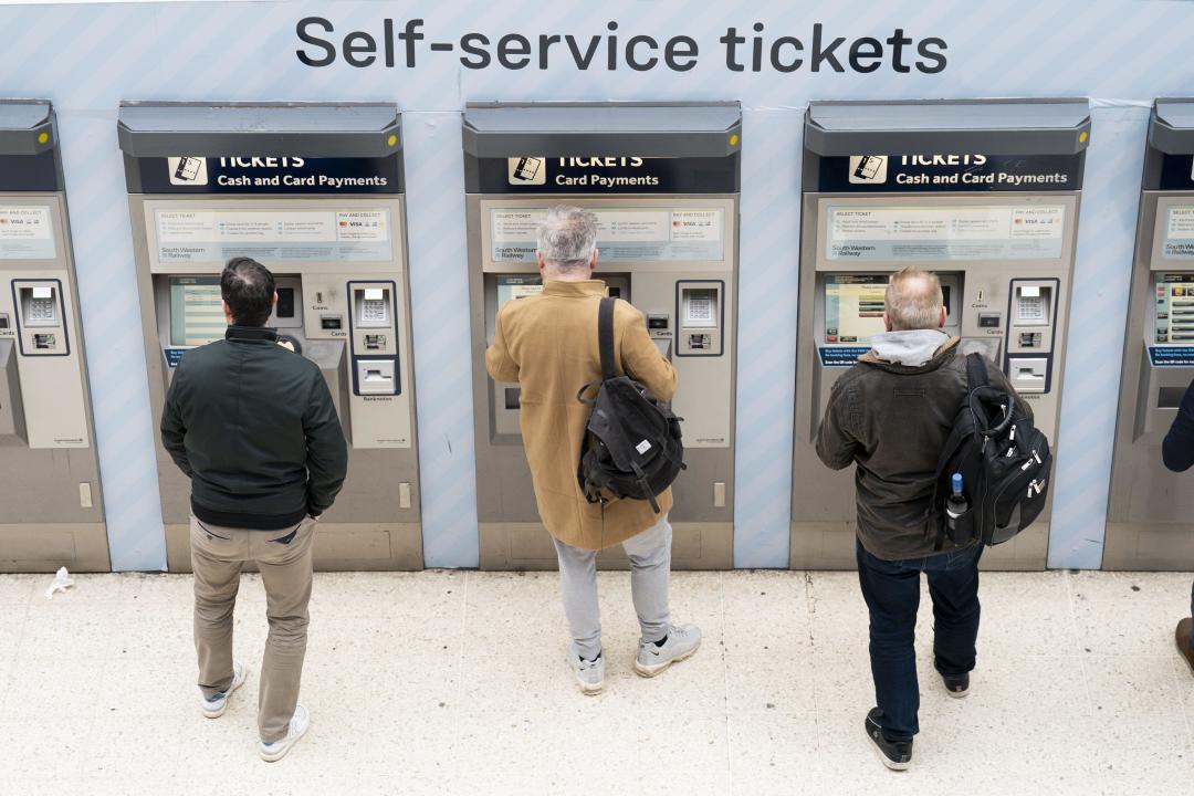 File photo dated 03/03/23 of people using a ticket machine at Waterloo train station in London. Office of Rail and Road data shows the percentage of train journeys made using season tickets has fallen to a record low, as the tickets accounted for just 13% of the 1.6 billion journeys taken on Britain's railways in the year to the end of March. Issue date: Tuesday June 18, 2024.