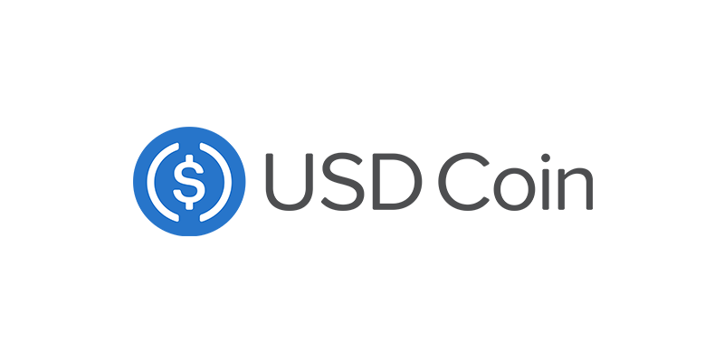 An illustration of the USD Coin stablecoin logo on a coin.