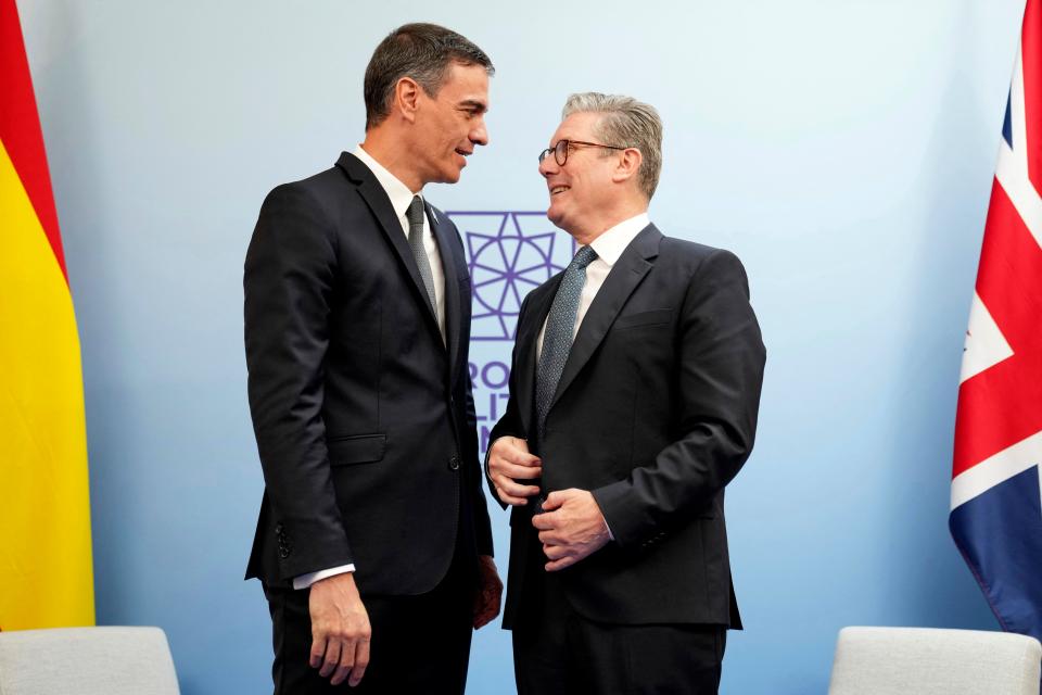 Britain's Prime Minister Keir Starmer (R) greets Spain's Prime Minister Pedro Sanchez during a bilateral meeting, at the European Political Community meeting, at Blenheim Palace earlier this month (POOL/AFP via Getty Images)