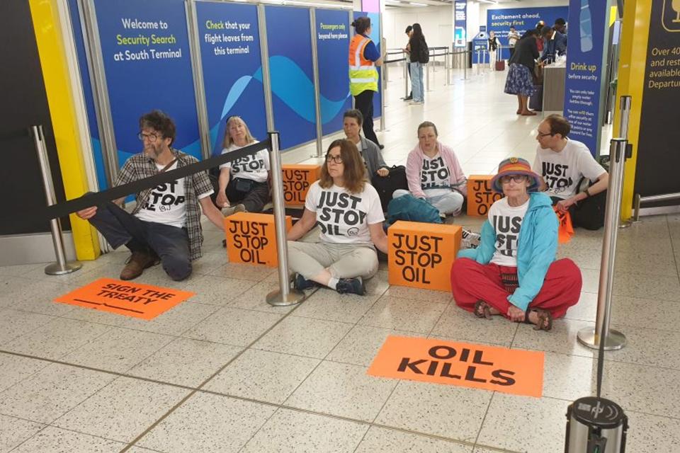 Protesters blocking the departure gates at Gatwick Airport (Just Stop Oil) (PA Media)