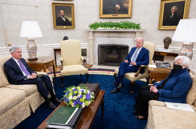 President Joe Biden, Chairman of the Federal Reserve Jerome Powell and Treasury Secretary Janet Yellen hold a meeting in the Oval Office of the White House in Washington, DC, May 31, 2022.
