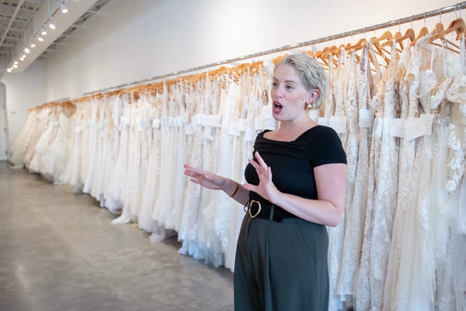 Owner Katie Yellin talks about her business at Bliss Bridal in Fairhope, Alabama on Thursday, June 20, 2024.