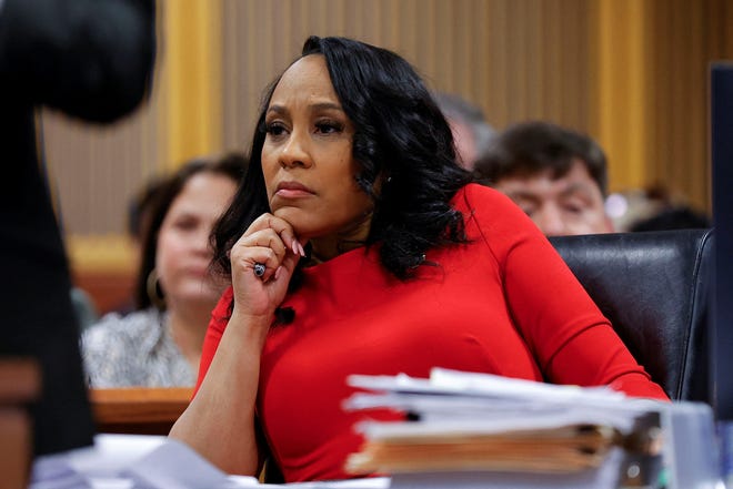 Fulton County District Attorney Fani Willis attends a hearing on the Georgia election interference case, March 1, 2024, in Atlanta, Georgia. The hearing is to determine whether Willis should be removed from the case because of a relationship with Nathan Wade, special prosecutor she hired in the election interference case against former President Donald Trump.