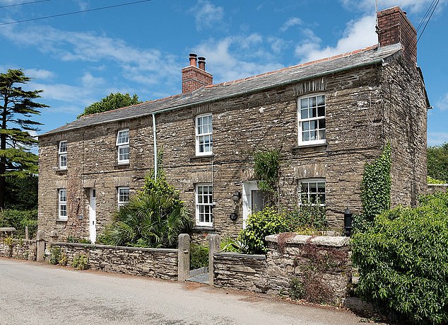 This rustic two-bedroom cottage is for sale for £425,000