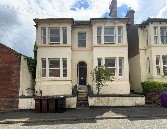 This double-fronted house hosts three self-contained flats, each on one floor of the property