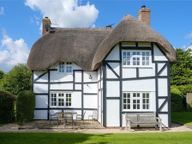 This delightful thatched house is on the market for £650,000